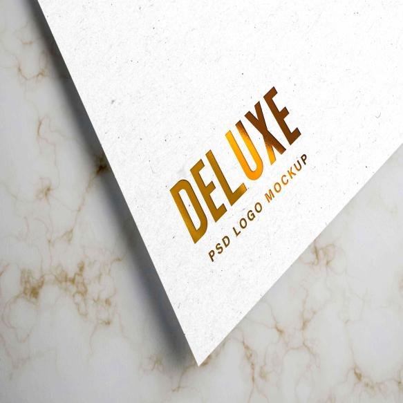Debossed Golden Logo Mockup White Paper