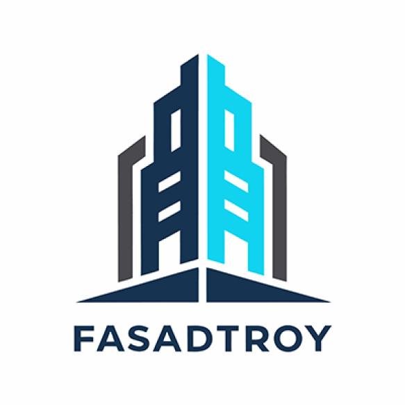 Blue Building With Blue Logo That Saysvesuegon It