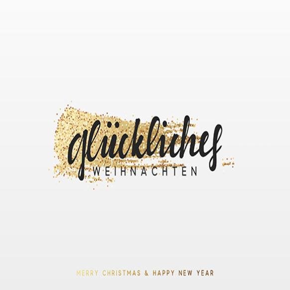 German Lettering Frohliche Weihnachten Christmas Background With Shining Gold Paint Brush Xmas Greet